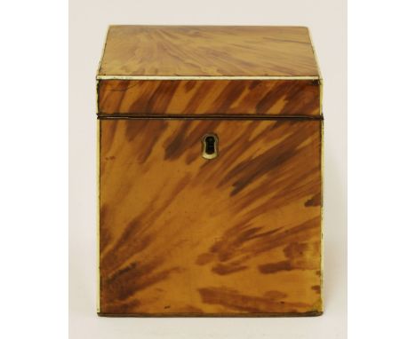 A tortoiseshell and ivory tea caddy, 19th century, with a lidded compartment, 9cm wide, 9cm deep, 10.5cm high