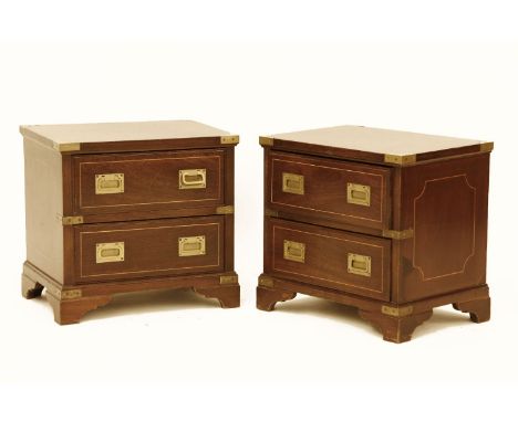 A pair of mahogany military design dwarf bedside chests, each fitted with two drawers on bracket feet, 49 x 36 x 47cm