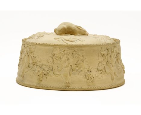 A 19th Century Wedgwood caneware game pie dish, with rabbit finial, moulded with grapevines and game, 26cm wide