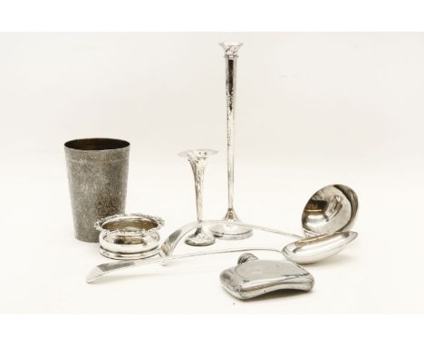 A collection of silver and silver plated items, to include two silver candlesticks, an Indian silver beaker, an F Mills and C