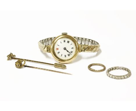 A Georgian gold split ring with cross hatch decoration, (tested as 14ct gold), a ladies 18ct gold mechanical watch with white