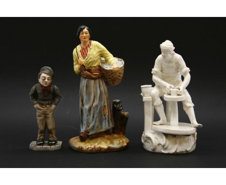 A Falcon ware pottery figure, entitled ‘The Breton Girl’ stamped Falcon Ware, English made, 22cm high, and a Royal Worcester 