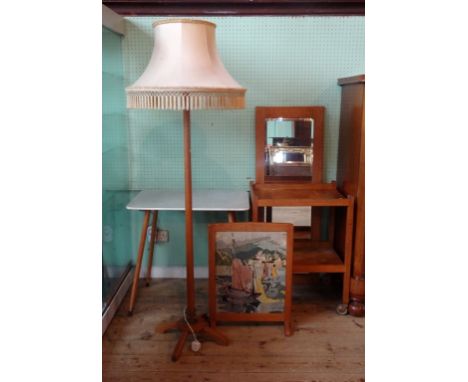 A mixed lot, to include: an oak standard lamp, a two tier oak trolley, a circa 1950's kitchen side table, a tapestry fire scr