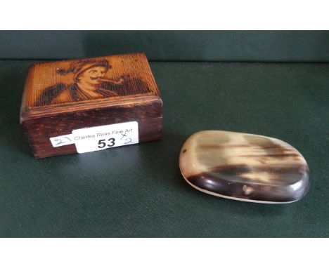 A 19th century snuff box, fashioned from horn, together with a Continental treen stamp box, the cover decorated with a pipe s