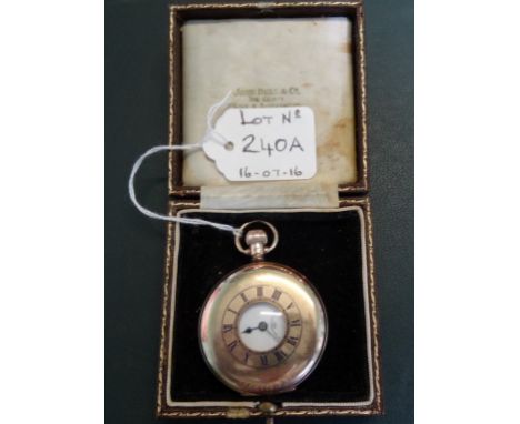 A 9 carat gold cased half-hunter top wind pocket watch, the enamel dial bearing Arabic numerals, subsidiary second dial at 6 