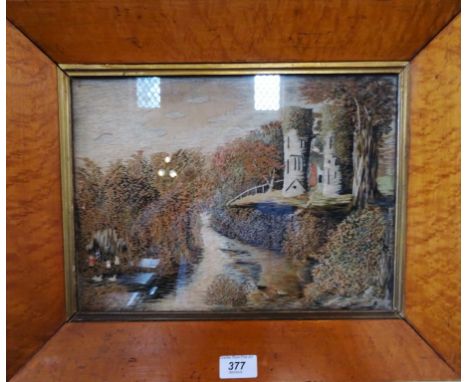 A tapestry, river scene (25cm x 34cm) glazed in a walnut frame.