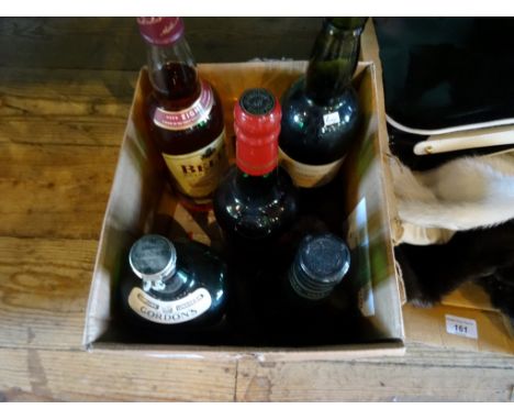 Five bottles of spirits, to include: Gordon's London Gin, Harvey's Amontillado Sherry, Bell's Scotch Whisky, Croft Original S