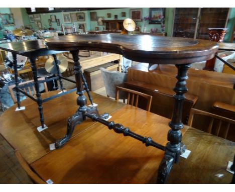 A Victorian kidney shaped side table, on turned and moulded supports united by bobbin stretcher (89cm).