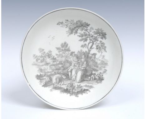 A Worcester Peeping Tom pattern saucer dish, printed in tones of grey, after an engraving by Robert Hancock with a courting c