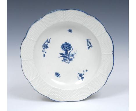 A Worcester The Gilliflower pattern circular plate, ozier-moulded border, printed in blue with floral sprigs and insects,  24