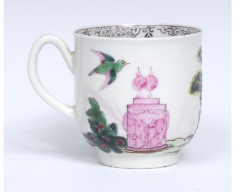 A Worcester Valentine pattern coffee cup, painted with two doves perched on a quiver of arrows, two hearts on an altar and a 