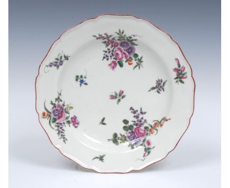 A Worcester shaped circular plate, possibly early James Giles,  painted with scattered sprigs and three colourful formal bouq