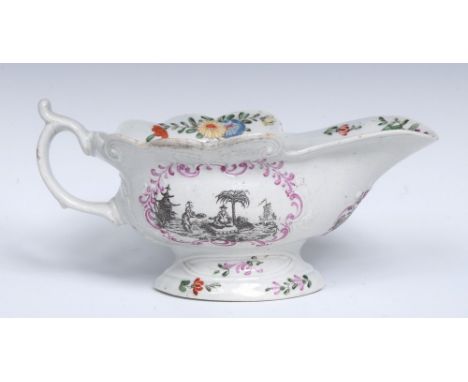 A Worcester high footed sauce boat, of the Smoky Primitive variety, printed in black with Chinoiserie scenes  and a bird, the