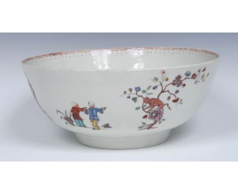 A Worcester punch bowl, painted in `Mandarin' style with two boys pointing at a  monkey sitting in a tree, a figure kissing a