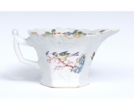 A Worcester hexagonal moulded cream boat, painted with colourful standing song bird, the verso with song bird on branch, the 