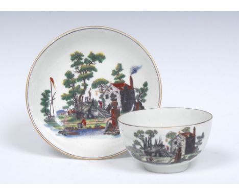 A Worcester tea bowl and saucer, printed after Robert Hancock, in brownish black and picked out in enamel colours, with The O