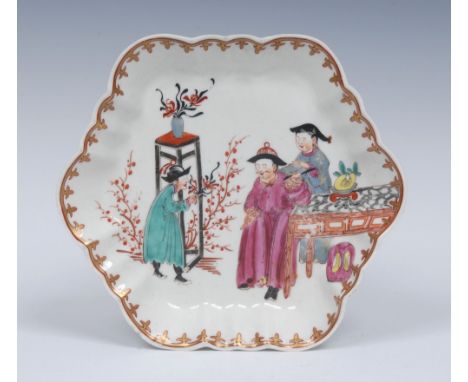 A Worcester The Magician pattern fluted hexagonal shaped teapot stand, painted in the Mandarin palette, gilt lambrequin borde