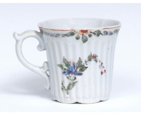 A Worcester straight flared ribbed moulded coffee cup, shaped rim, enamelled in famille rose palette with floral sprigs, form