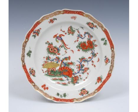 A Worcester Phoenix pattern silver shaped plate,  painted in the Kakiemon palette, with yellow-headed birds perched on exotic