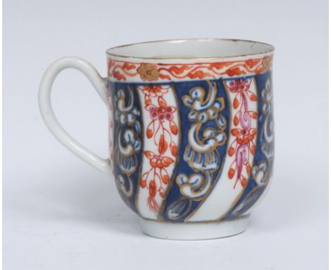 A Worcester Queen Charlotte coffee cup, typically decorated with alternating iron red and blue spirals, picked out in gilt, r