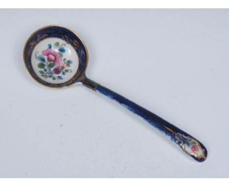 A Worcester sauce tureen ladle, the bowl painted with flowers and foliage, banded blue border and handle, outlined in gilt, c