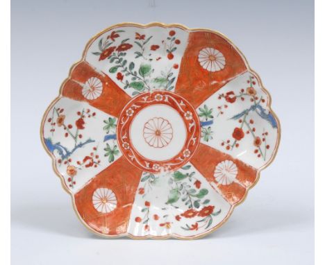 A Worcester Scarlet Japan pattern hexagonal shape teapot stand,  decorated with orange panels reserved with mons, alternating