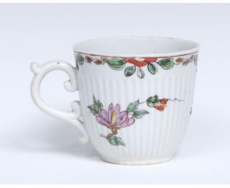 A Worcester ribbed coffee cup, decorated in the famille rose palette with two flowering peony branches and insects, formal fl
