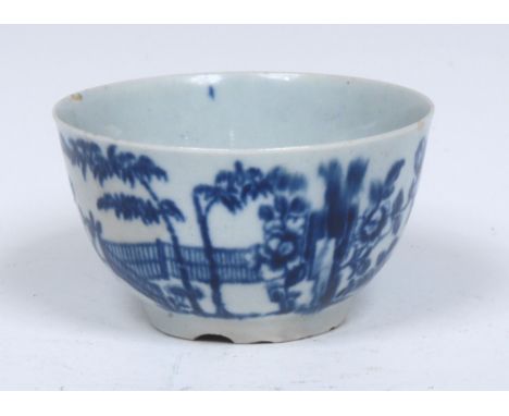 A Worcester The Plantation pattern tea bowl, painted in underglaze blue with huts, landscape, trees and foliage, 7cm diam, wo