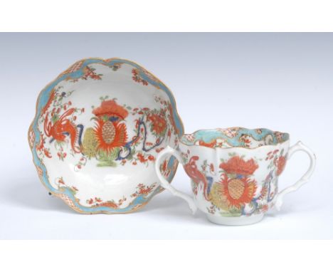 A Worcester Jabberwocky pattern ogee chocolate cup and saucer, shaped rims, scroll moulded scroll handles, painted in the Kak