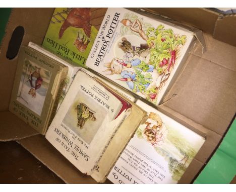 A collection of Beatrix Potter books including a first edition copy of The Tale of Pigling Bland 