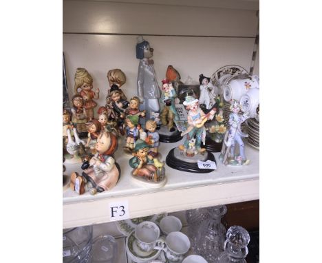 A collection of figures including 11 Goebel figures, 3 other West German figures in similar style, 2 Country Artists, 2 Regen
