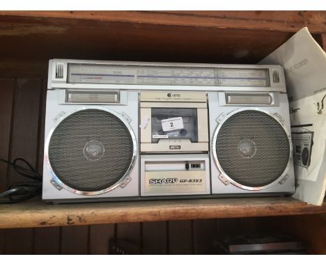 A vintage Sharp GF-6363 'The Searcher' radio/cassette recorder. 