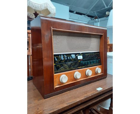 A vintage Bush radio, height 39cm, width 50.5cm and depth 22cm. Radio appears to be in good condition but has not been tested