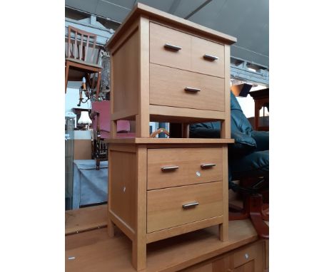 A pair of modern G Plan light oak bedside cabinets, width 57.5cm, depth 43cm and height 53.5cm 