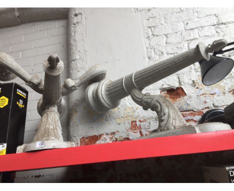 Two large cast metal outdoor wall light fittings, highest 82cm. 