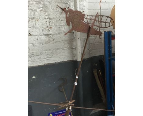 A metal weather vane. 