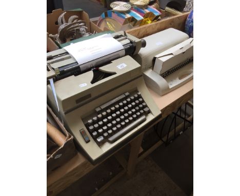 A vintage Imperial typewriter and a Rexel CB256 binder and accessories. 