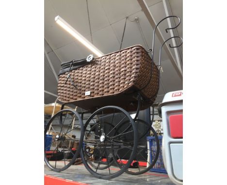 A vintage dolls pram 
