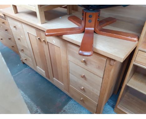 A modern light oak sideboard, length 160cm, depth 55cm and height 86cm 