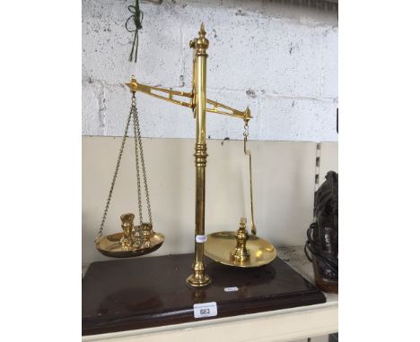 Set of brass pan scales with weights 
