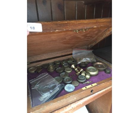 A wooden case / box containing Imperial weights for scales. 