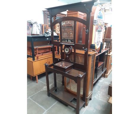 A hall stand with barometer and mirror, width 92.5cm, depth 29cm and height 196cm 