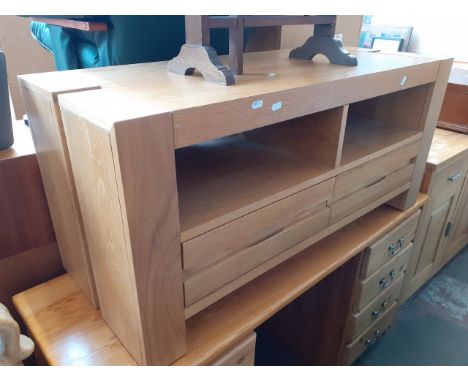 A light oak tv stand, height 50.5cm, width 110cm and depth 45cm 