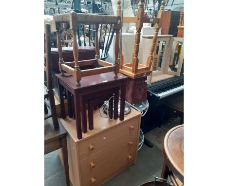 10 pieces of furniture; a chest of drawers, a nest of tables, two stools, a small drop leaf table, a carved folding table, a 