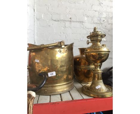 A brass coal bucket, brass lamp, brass jug and a vintage pan 