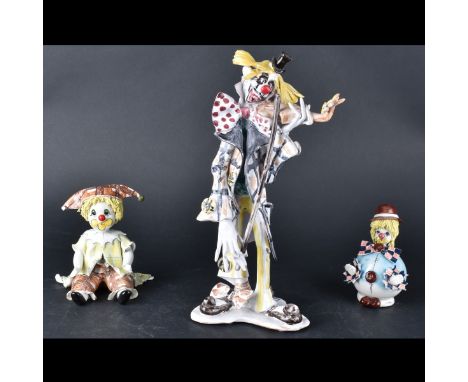 Three (3) Vintage Hand Painted Ceramic Clown Figurines. Each signed. Tallest measures 12-1/2" H, smallest measures 5-1/8" H. 