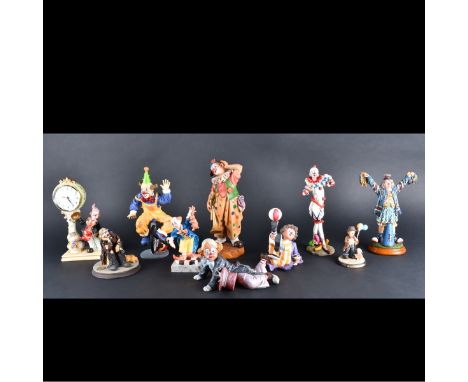 Grouping of Ten (10) Vintage Hand Painted Clown Figurines. A few are signed. Comprised of composition, porcelain, and wood fi