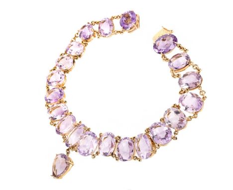 Vintage Approx. 300.00 Carat Amethyst and 14 Karat Yellow Gold Necklace. Consisting of 20 graduated oval cut amethysts and on