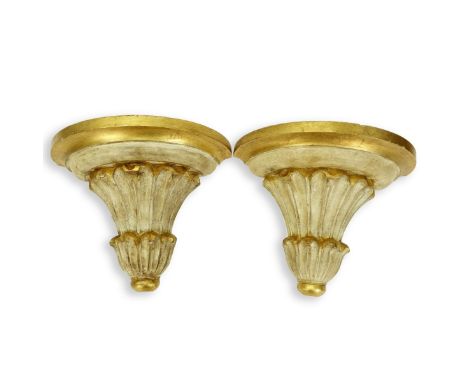 Pair of Italian Style Giltwood Wall Brackets. Measures 11-1/2" H x 14-3/4" W. Condition: Light scratches to edges, rubbing ot