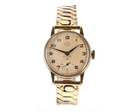 Smiths De Luxe 9ct gentleman's bracelet watch, London 1961, the cream dial with Arabic numerals, blued steel sword hands and 